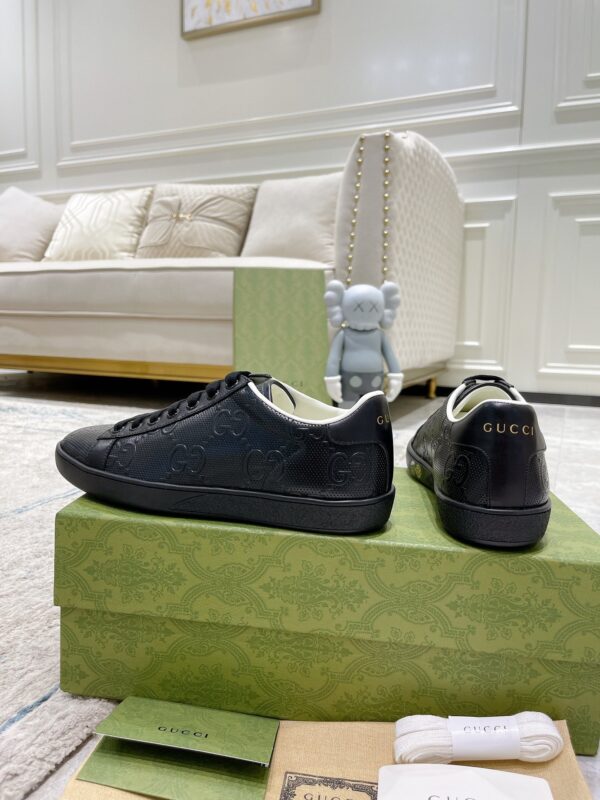 sy_no_02C19A4BC757D29C5B629F646AC1AFBC_3 Gucci Ace Black GG Embossed Leather Low-Top Sneakers