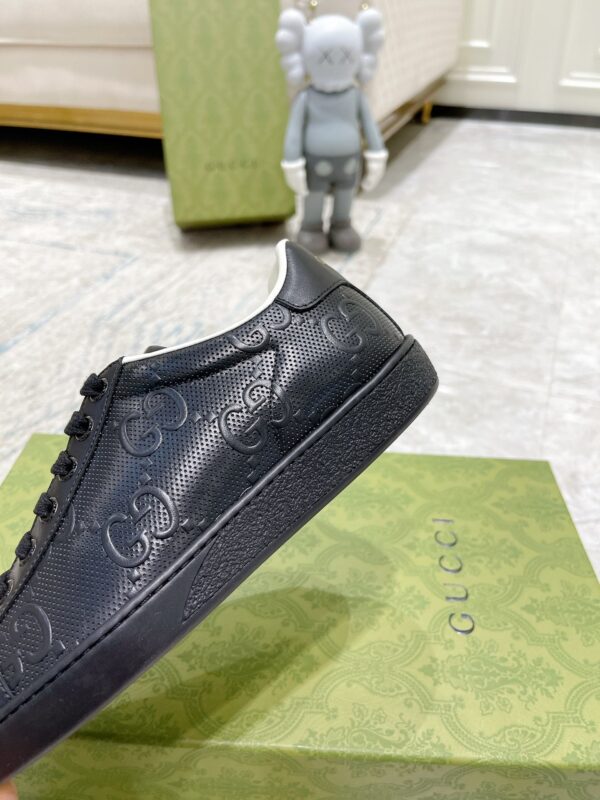 sy_no_02C19A4BC757D29C5B629F646AC1AFBC_6 Gucci Ace Black GG Embossed Leather Low-Top Sneakers