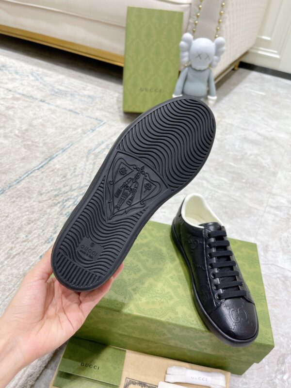 sy_no_02C19A4BC757D29C5B629F646AC1AFBC_8 Gucci Ace Black GG Embossed Leather Low-Top Sneakers