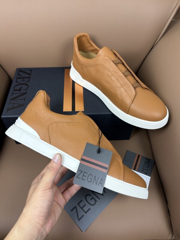 sy_no_04A70846A6F14AE2FC6423032BC7838A_0 Caramel & Camel Textured Leather Slip-On Sneakers