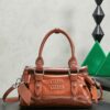 sy_no_066FA3D7F3DB043995F2A512C4596821_0 Miu Miu New Oiled-Wax Leather Bow Biker-Style Bag – Vintage, Spacious, Multi-Way Bag (Underarm, Shoulder, Crossbody, Handheld) – Brown