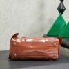 sy_no_066FA3D7F3DB043995F2A512C4596821_3 Miu Miu New Oiled-Wax Leather Bow Biker-Style Bag – Vintage, Spacious, Multi-Way Bag (Underarm, Shoulder, Crossbody, Handheld) – Brown