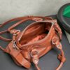sy_no_066FA3D7F3DB043995F2A512C4596821_5 Miu Miu New Oiled-Wax Leather Bow Biker-Style Bag – Vintage, Spacious, Multi-Way Bag (Underarm, Shoulder, Crossbody, Handheld) – Brown