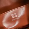 sy_no_066FA3D7F3DB043995F2A512C4596821_6 Miu Miu New Oiled-Wax Leather Bow Biker-Style Bag – Vintage, Spacious, Multi-Way Bag (Underarm, Shoulder, Crossbody, Handheld) – Brown