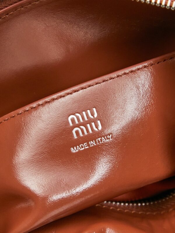 sy_no_066FA3D7F3DB043995F2A512C4596821_6 Miu Miu New Oiled-Wax Leather Bow Biker-Style Bag – Vintage, Spacious, Multi-Way Bag (Underarm, Shoulder, Crossbody, Handheld) – Brown