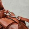 sy_no_066FA3D7F3DB043995F2A512C4596821_7 Miu Miu New Oiled-Wax Leather Bow Biker-Style Bag – Vintage, Spacious, Multi-Way Bag (Underarm, Shoulder, Crossbody, Handheld) – Brown