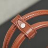 sy_no_066FA3D7F3DB043995F2A512C4596821_8 Miu Miu New Oiled-Wax Leather Bow Biker-Style Bag – Vintage, Spacious, Multi-Way Bag (Underarm, Shoulder, Crossbody, Handheld) – Brown
