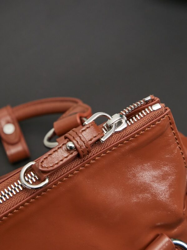 sy_no_066FA3D7F3DB043995F2A512C4596821_9 Miu Miu New Oiled-Wax Leather Bow Biker-Style Bag – Vintage, Spacious, Multi-Way Bag (Underarm, Shoulder, Crossbody, Handheld) – Brown