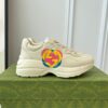 sy_no_107B814EF7F7BF404C74984D5D53EAEC_0 Gucci Rhyton Interlocking G Heart Leather Sneaker in Off-White