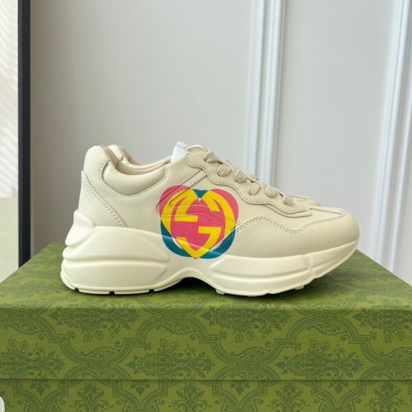 sy_no_107B814EF7F7BF404C74984D5D53EAEC_0 Gucci Rhyton Interlocking G Heart Leather Sneaker in Off-White