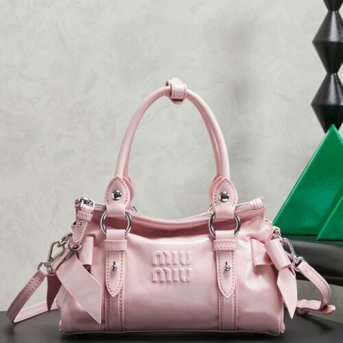 sy_no_112491CD56A01B8A09A8DC19069DA155_0 New Miu Miu Oiled-Wax Leather Bow Biker-Style Bag – Vintage, Large-Capacity Bag (Underarm/Shoulder/Crossbody/Handheld)