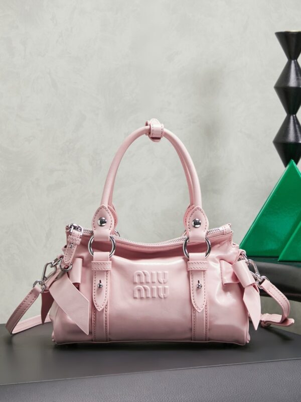 sy_no_112491CD56A01B8A09A8DC19069DA155_0 New Miu Miu Oiled-Wax Leather Bow Biker-Style Bag – Vintage, Large-Capacity Bag (Underarm/Shoulder/Crossbody/Handheld)