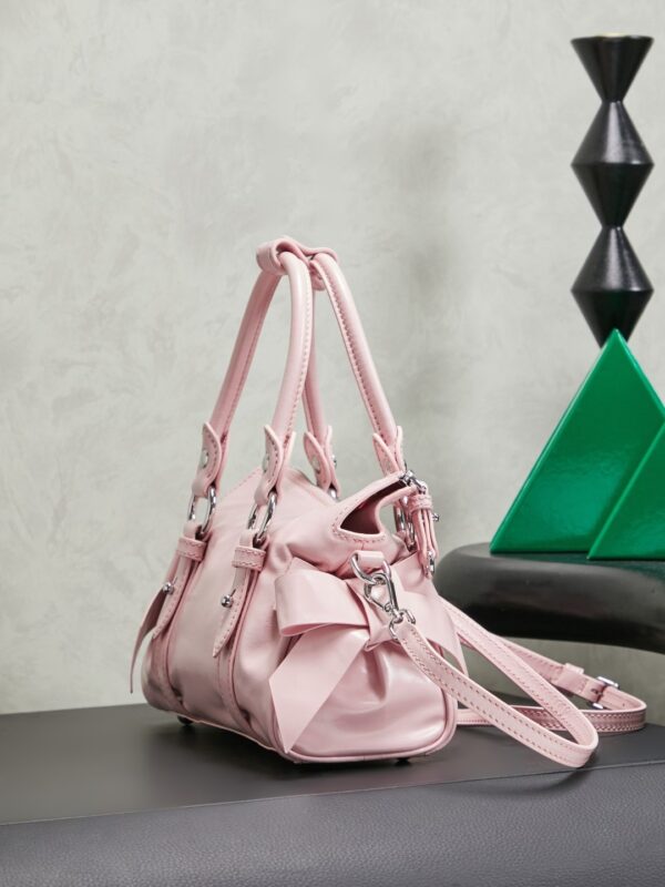 sy_no_112491CD56A01B8A09A8DC19069DA155_2 New Miu Miu Oiled-Wax Leather Bow Biker-Style Bag – Vintage, Large-Capacity Bag (Underarm/Shoulder/Crossbody/Handheld)