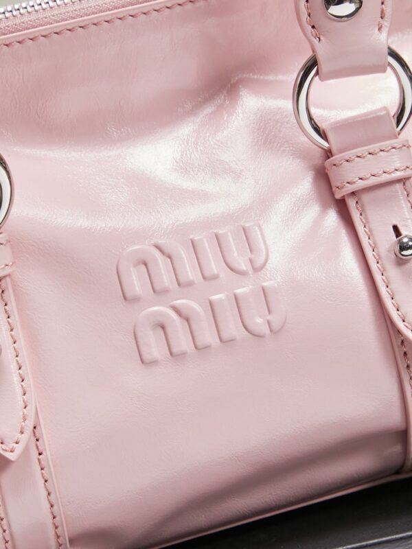 sy_no_112491CD56A01B8A09A8DC19069DA155_4 New Miu Miu Oiled-Wax Leather Bow Biker-Style Bag – Vintage, Large-Capacity Bag (Underarm/Shoulder/Crossbody/Handheld)