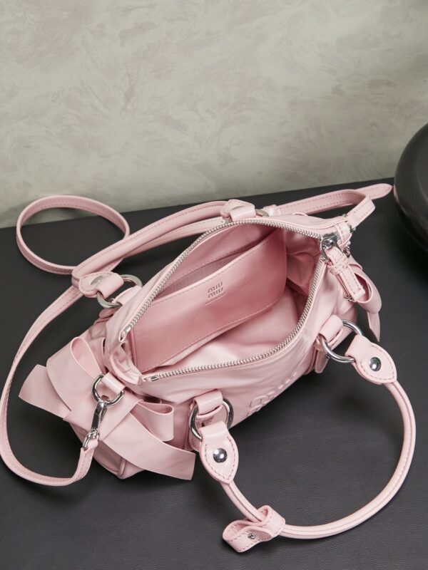 sy_no_112491CD56A01B8A09A8DC19069DA155_5 New Miu Miu Oiled-Wax Leather Bow Biker-Style Bag – Vintage, Large-Capacity Bag (Underarm/Shoulder/Crossbody/Handheld)