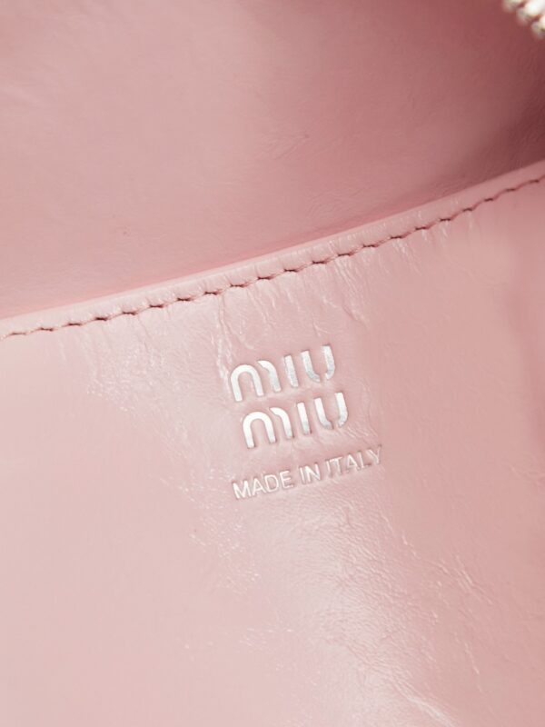 sy_no_112491CD56A01B8A09A8DC19069DA155_6 New Miu Miu Oiled-Wax Leather Bow Biker-Style Bag – Vintage, Large-Capacity Bag (Underarm/Shoulder/Crossbody/Handheld)