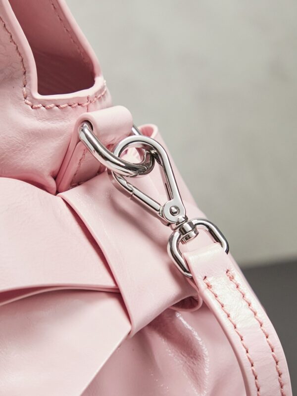 sy_no_112491CD56A01B8A09A8DC19069DA155_8 New Miu Miu Oiled-Wax Leather Bow Biker-Style Bag – Vintage, Large-Capacity Bag (Underarm/Shoulder/Crossbody/Handheld)