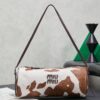 sy_no_18A90563F10555AA20CD79D8D94C1648_0 Miu Miu New Cylindrical Leather Bag