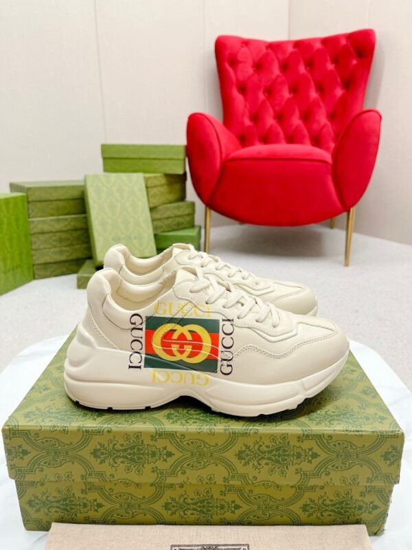 sy_no_19F5F11DD25788B415EEA81A5D3FE9D1_0 Gucci Rhyton Worldwide Vintage Logo Sneaker in Off-White Leather