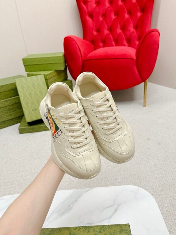 sy_no_19F5F11DD25788B415EEA81A5D3FE9D1_2 Gucci Rhyton Worldwide Vintage Logo Sneaker in Off-White Leather