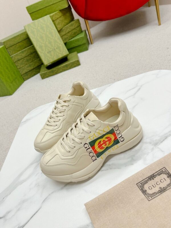 sy_no_19F5F11DD25788B415EEA81A5D3FE9D1_4 Gucci Rhyton Worldwide Vintage Logo Sneaker in Off-White Leather