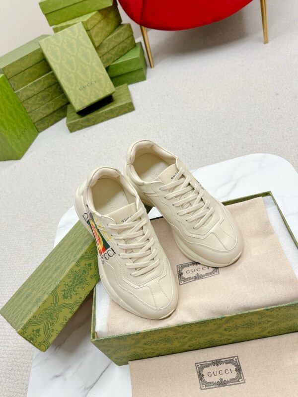 sy_no_19F5F11DD25788B415EEA81A5D3FE9D1_5 Gucci Rhyton Worldwide Vintage Logo Sneaker in Off-White Leather