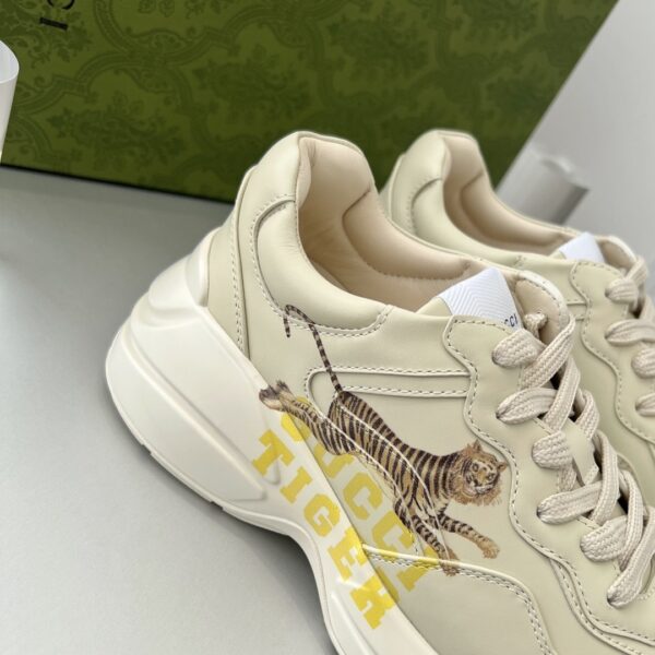 sy_no_20743E3C3C45B7A91DC250A2D2C114E8_6 Gucci Rhyton “Gucci Tiger” Print Leather Sneaker in Off-White