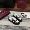 sy_no_21CB02F14890A04606235B99A25B5987_0 Gucci Re-Web Sneaker in Black & White Leather with Web Stripe