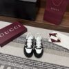 sy_no_21CB02F14890A04606235B99A25B5987_1 Gucci Re-Web Sneaker in Black & White Leather with Web Stripe
