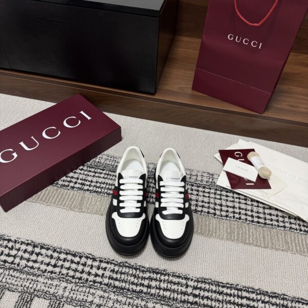 sy_no_21CB02F14890A04606235B99A25B5987_1 Gucci Re-Web Sneaker in Black & White Leather with Web Stripe