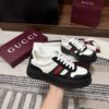 sy_no_21CB02F14890A04606235B99A25B5987_4 Gucci Re-Web Sneaker in Black & White Leather with Web Stripe