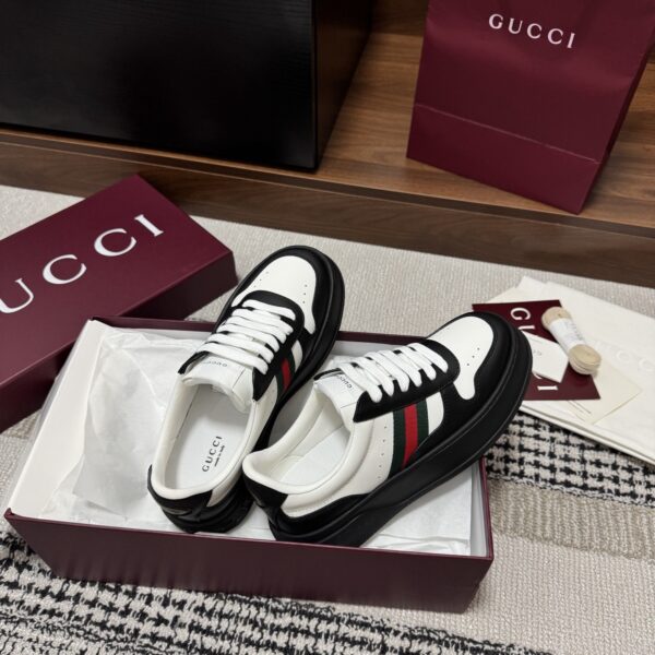 sy_no_21CB02F14890A04606235B99A25B5987_5 Gucci Re-Web Sneaker in Black & White Leather with Web Stripe