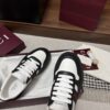 sy_no_21CB02F14890A04606235B99A25B5987_6 Gucci Re-Web Sneaker in Black & White Leather with Web Stripe