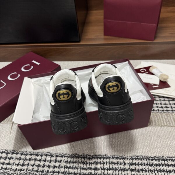 sy_no_21CB02F14890A04606235B99A25B5987_7 Gucci Re-Web Sneaker in Black & White Leather with Web Stripe
