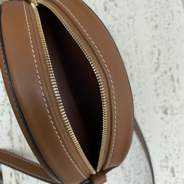 sy_no_2222614781C0794A9922930147CFEAF9_7 Brown Triomphe Small Oval Crossbody Bag