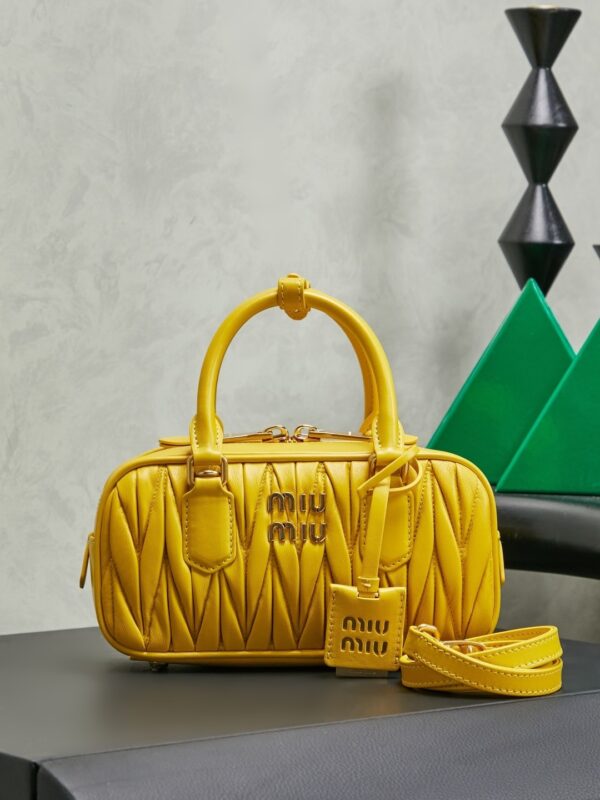 sy_no_24E79A922E06620FD303E9D63BB12C53_0 Miu Miu Matelassé Bowling Bag (Yellow)