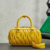 sy_no_24E79A922E06620FD303E9D63BB12C53_1 Miu Miu Matelassé Bowling Bag (Yellow)