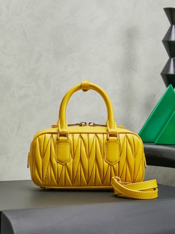 sy_no_24E79A922E06620FD303E9D63BB12C53_1 Miu Miu Matelassé Bowling Bag (Yellow)