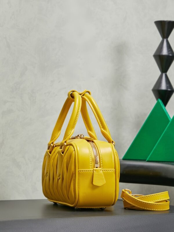 sy_no_24E79A922E06620FD303E9D63BB12C53_2 Miu Miu Matelassé Bowling Bag (Yellow)