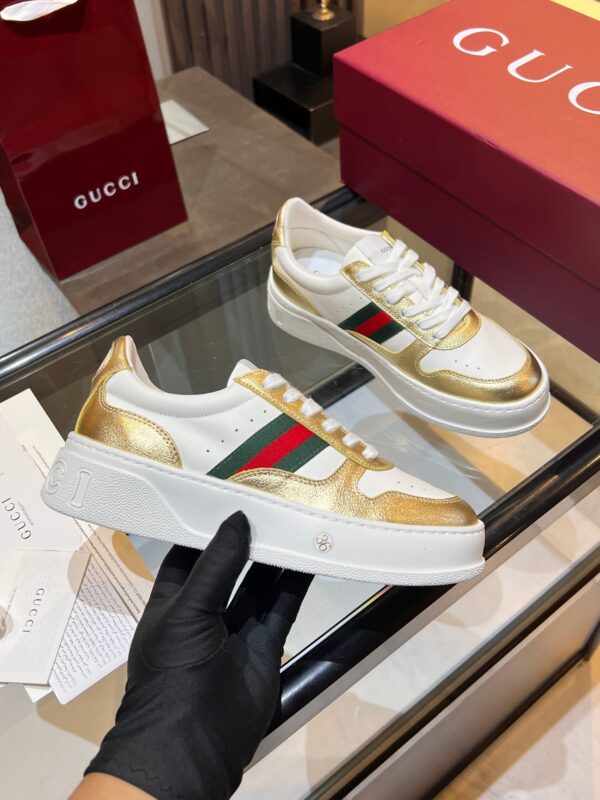 sy_no_25A976A8ED9A2DAAB966DB1A101651E2_0 Gucci Web & Metallic Gold Leather Platform Sneaker – White / Metallic Gold
