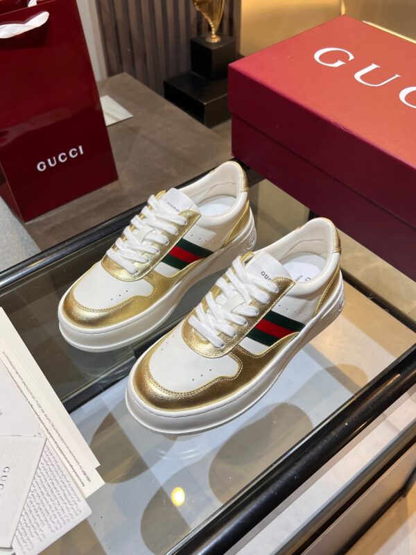 sy_no_25A976A8ED9A2DAAB966DB1A101651E2_1 Gucci Web & Metallic Gold Leather Platform Sneaker – White / Metallic Gold