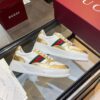 sy_no_25A976A8ED9A2DAAB966DB1A101651E2_7 Gucci Web & Metallic Gold Leather Platform Sneaker – White / Metallic Gold
