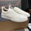 sy_no_282B457498AD448547F9BEB0BE85F953_1 Cream Pebbled Suede Triple-Cross Slip-On Shoes