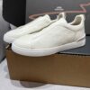 sy_no_282B457498AD448547F9BEB0BE85F953_2 Cream Pebbled Suede Triple-Cross Slip-On Shoes