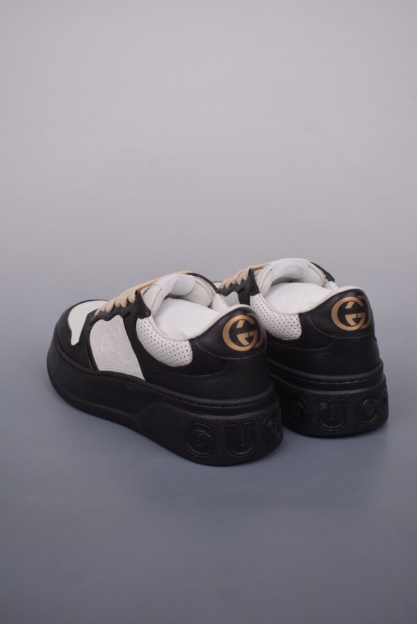 sy_no_2A3D1A6F57A5F010EB2148753BC45A31_1 Gucci Re-Web Sneaker in Black & White Perforated Leather with Interlocking GG