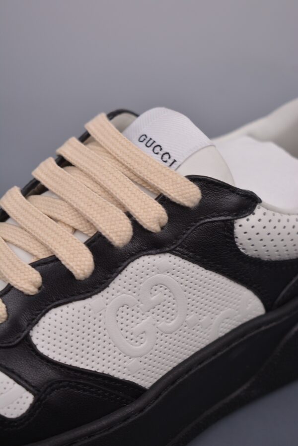 sy_no_2A3D1A6F57A5F010EB2148753BC45A31_6 Gucci Re-Web Sneaker in Black & White Perforated Leather with Interlocking GG
