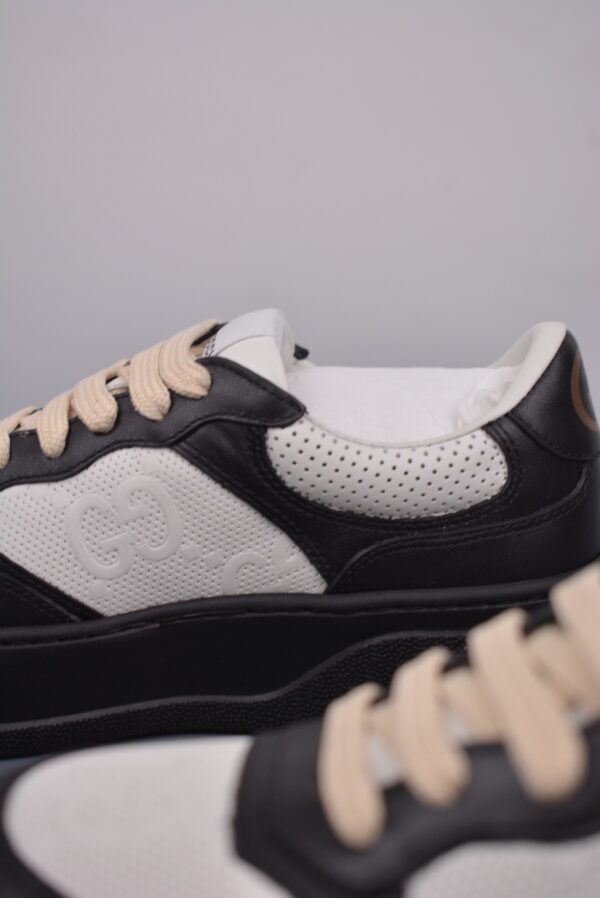 sy_no_2A3D1A6F57A5F010EB2148753BC45A31_7 Gucci Re-Web Sneaker in Black & White Perforated Leather with Interlocking GG