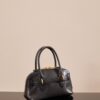 sy_no_2B9FE93E7F339C43359A2ABA357112C5_0 Miu Miu Aventure Mini Bag in Black
