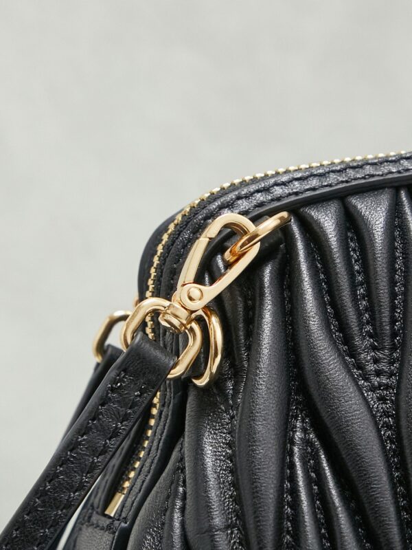 Black Matelassé Shell Backpack
