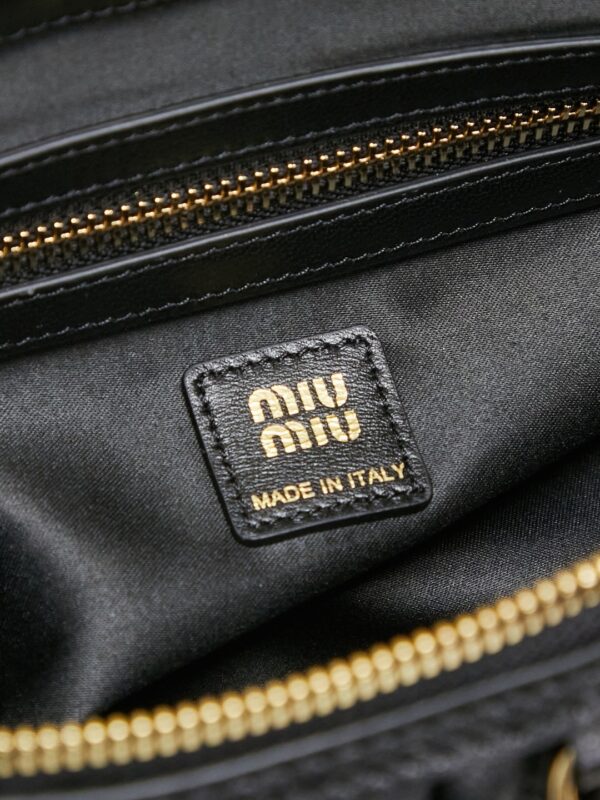 Black Matelassé Shell Backpack